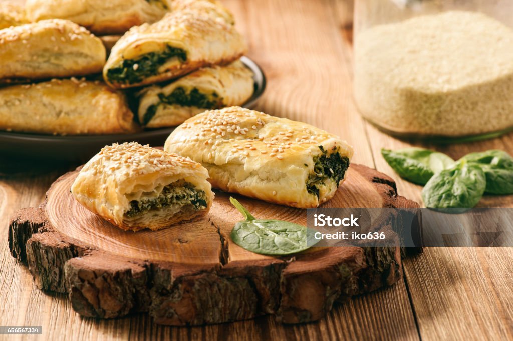 Puff pastry rolls with spinach and ricotta.